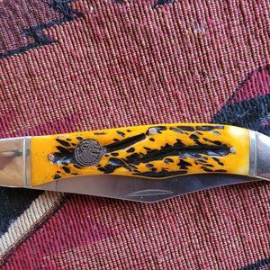 NAHC Hunters Classic folding knife with bone handle.